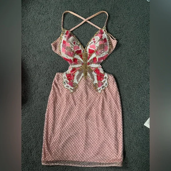 Homecoming dress with varied shades of pink, displaying a beautiful butterfly. - Picture 4 of 5